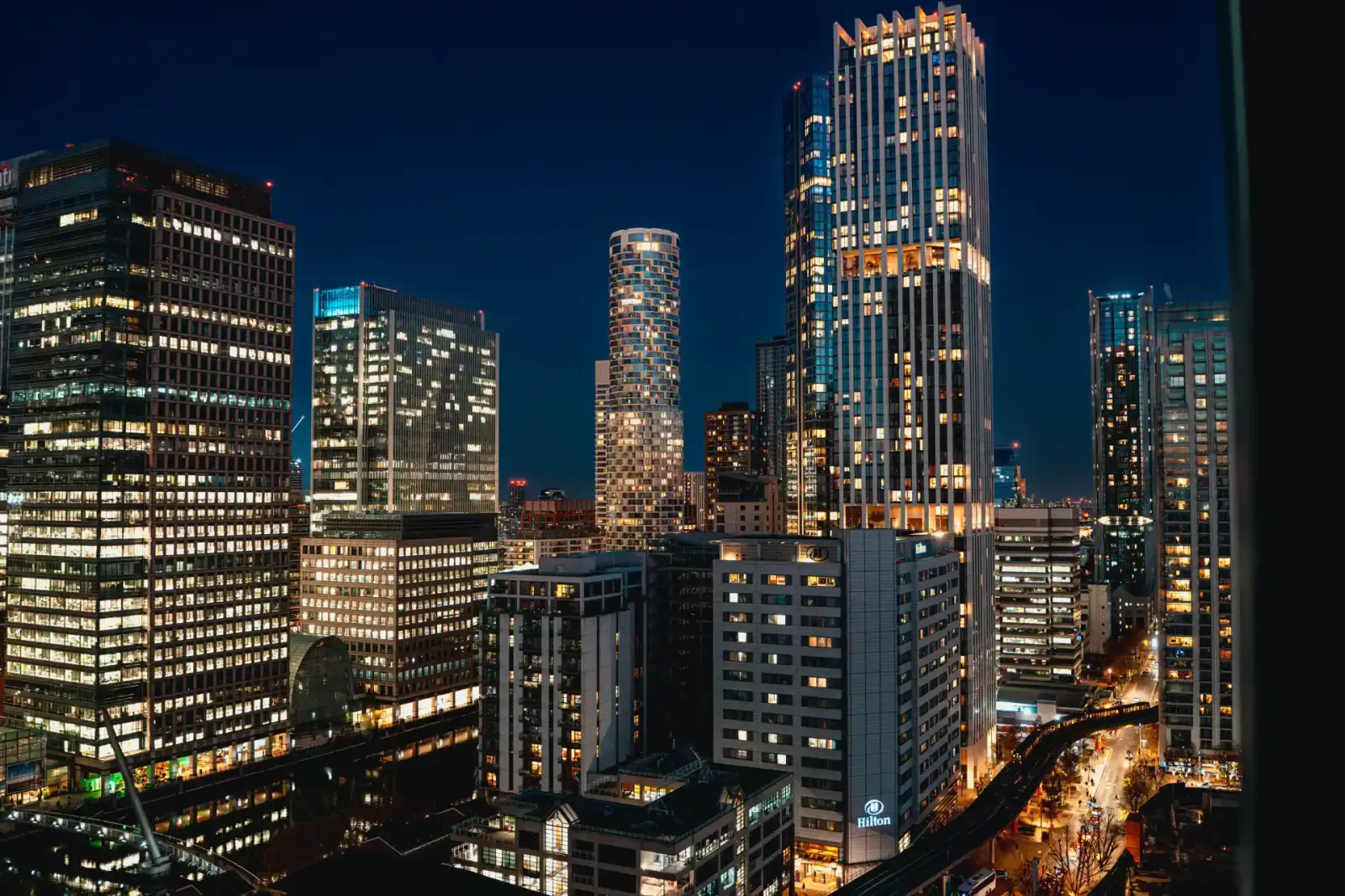 Night-time view of the Canary Wharf skyline from Qibo